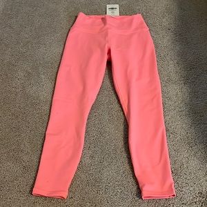 Fabletics 7/8 Power Hold Leggings. NWT pretty pinkish coral color.